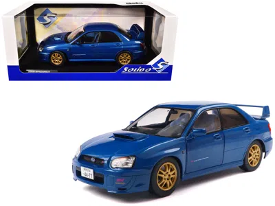 Solido 2003 Subaru Impreza Wrx Sti Rhd (right Hand Drive) Sonic Blue Metallic With Gold Wheels 1/18 Diecast