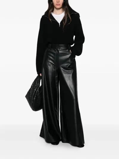 Solotre Half-zip Ribbed-knit Sweater In Black