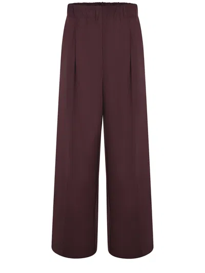 Solotre Trousers In Brown