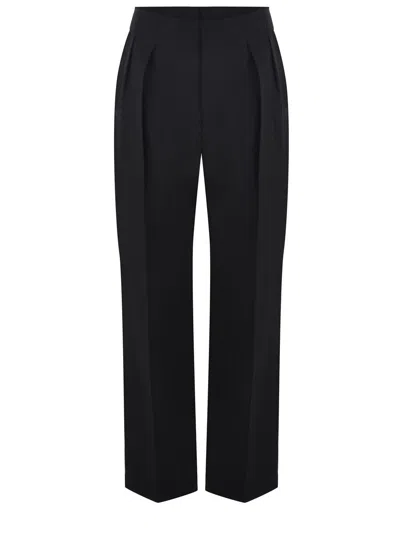 Solotre Trousers In Black