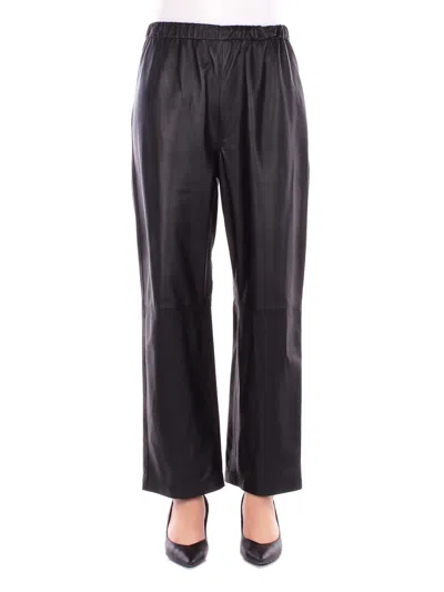 Solotre Trousers In Black