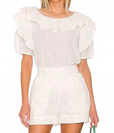 Something Navy Eyelet Short Sleeve Ruffle Top In White In Blue