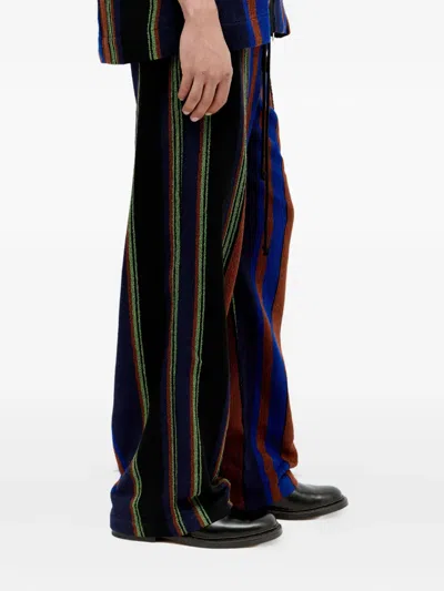 Song For The Mute Striped Rope-detail Trousers In Multi