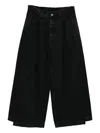 Songzio Asymmetric Cut Flare Jeans In Black