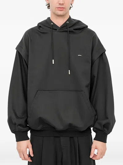 Songzio Embroidered Layered-sleeve Hoodie In Black