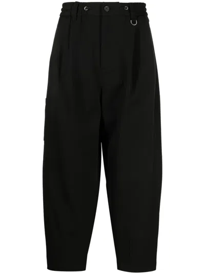 Songzio Logo-embroidered Pleated Drop-crotch Trousers In Black