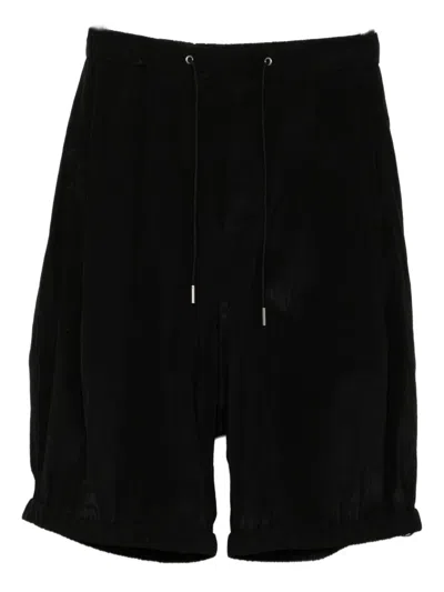 Songzio Saluel Trousers In Black
