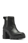 Sorel Caribou X Chelsea Heels Black In Black/black