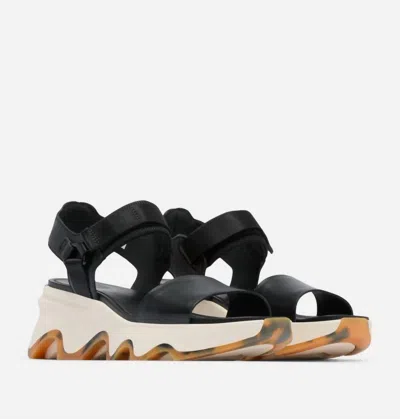 Sorel Women Kinetic Impact Y Strap High Wedge Sandal In Black/chalk In Multi