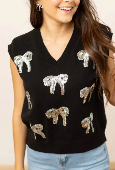 Southern Grace Sequin Bow Sweater Vest In Black