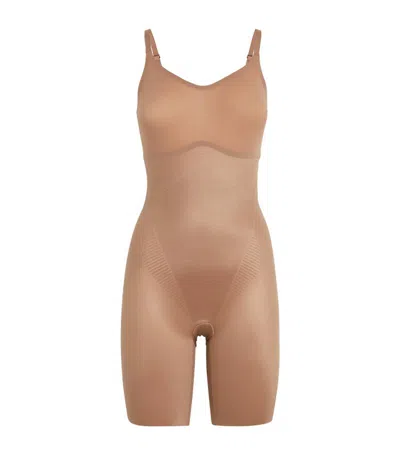 Spanx Invisible Shaping Mid-thigh Bodysuit In Nude