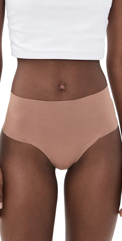 Spanx Supersmooth Undie-tectable Cotton Thong Cafe Au Lait In Brown