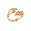 Spero London New Hug Ring With Hands Sterling Silver And Gold Plated