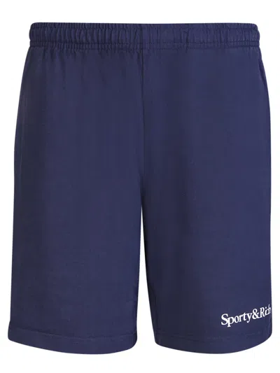 Sporty &amp; Rich Serif Bermuda Shorts In Navy Blue In Yellow