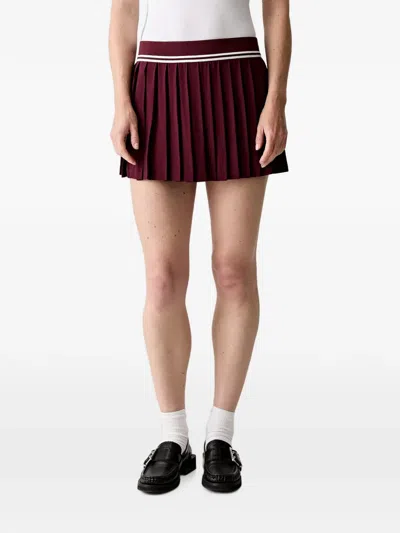 Sporty And Rich Abigail Pleated Logo-embroidered Mini Skirt In Red