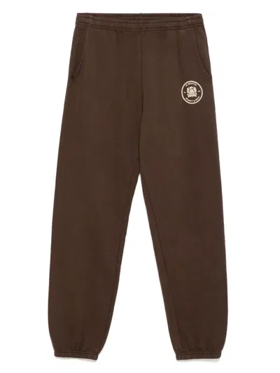 Sporty And Rich Bristol Crest 100th Pants In Chocolate