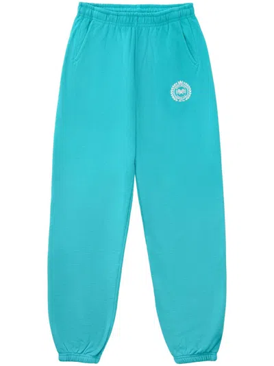 Sporty And Rich Crest Cotton Track Pants In Blue