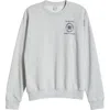 Sporty And Rich Sporty & Rich Crest Seal 100th Anniversary Graphic Sweatshirt In Heather Gray