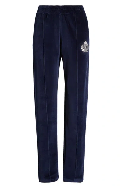 Sporty And Rich Sporty & Rich Crest Velour Track Pants In Navy