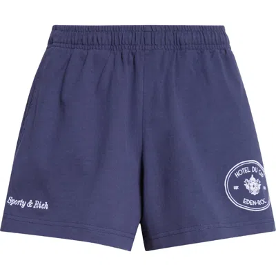 Sporty And Rich Sporty & Rich Eden Crest Cotton Disco Shorts In Blue
