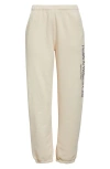 Sporty And Rich Sporty & Rich Health & Wellness Graphic Sweatpants In Light Beige