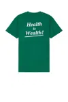 SPORTY AND RICH HEALTH IS WEALTH TEE