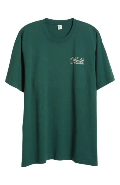 Sporty And Rich Sporty & Rich Health Script Cotton Graphic T-shirt In Forest