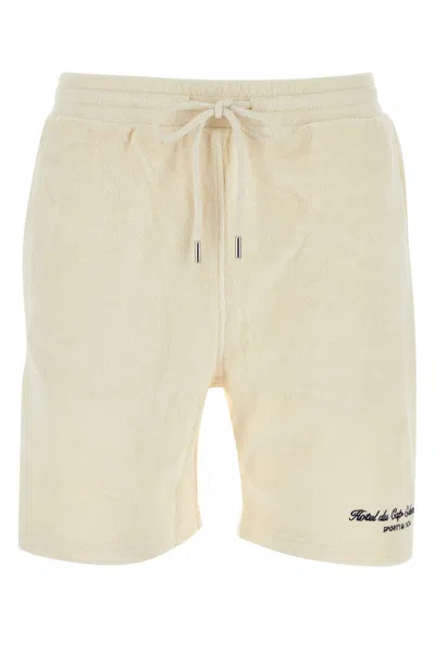 SPORTY AND RICH SPORTY & RICH CREAM TERRY FABRIC HOTEL DU CAP CURSIVE SHORTS
