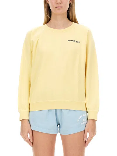 Sporty And Rich Yellow Serif Logo Sweatshirt