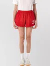 Sporty And Rich Womens Ruby Varsity Crest Disco Two-slip-pockets Cotton-jersey Shorts
