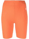 Sporty And Rich Logo-patch Ribbed-knit Biker Shorts In Orange