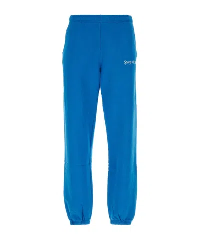 Sporty And Rich Logo Printed Sweatpants In Blue