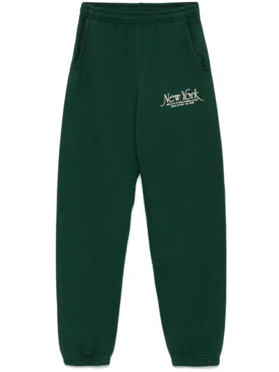 Sporty And Rich Ny 94 Printed Cotton-jersey Sweatpants In Forest