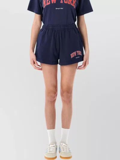 Sporty And Rich Sporty & Rich New York Ivy Logo Printed Shorts In Navy