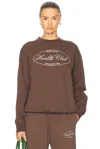 Sporty And Rich Oval Health Crewneck Sweater In Chocolate
