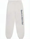 Sporty And Rich Relaxed Fit Track Pants With Vertical Script Logo In Neutral