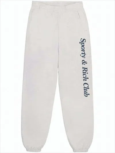Sporty And Rich Relaxed Fit Track Pants With Vertical Script Logo In Neutral