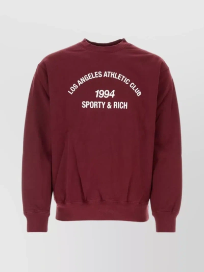 Sporty And Rich Ribbed Crew-neck Sweatshirt With Printed Front In Burgundy