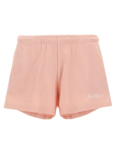 Sporty And Rich Sporty & Rich Rizzoli Logo Printed Shorts In Pink