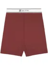Sporty And Rich Runner Script Bike Shorts In Brown