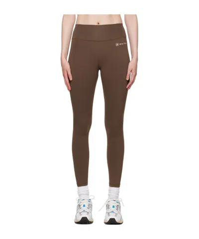 Sporty And Rich Runner Script Logo-print Leggings In Brown