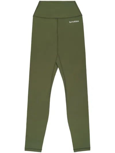 Sporty And Rich Serif Logo Performance Leggings In Green
