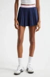 Sporty And Rich Sporty & Rich Serif Logo Pleated Miniskirt In Navy