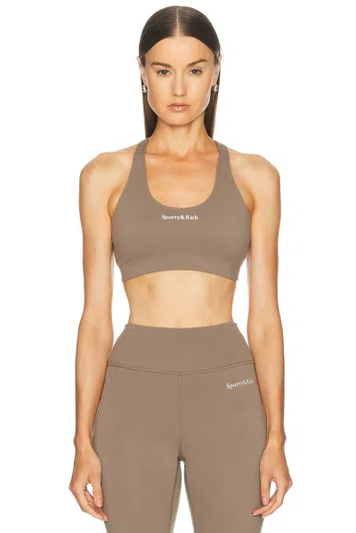 Sporty And Rich Serif Logo Sports Bra In Sand