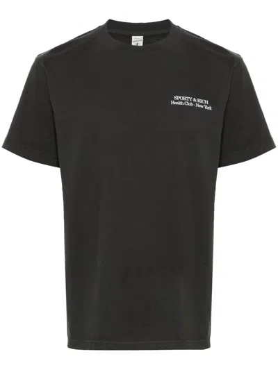 Sporty And Rich Slogan-print Cotton T-shirt In Black