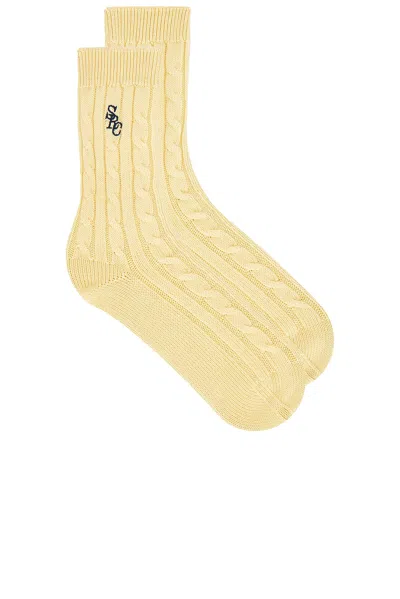 Sporty And Rich Src Cableknit Socks In Blue