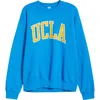 Sporty And Rich Sporty & Rich Ucla Ivy Fleece Logo Graphic Sweatshirt In Blue