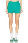 Sporty And Rich Varsity Crest Soft Disco Short In Green