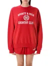 Sporty And Rich Sporty & Rich Varsity Crest Crewneck Graphic Sweatshirt In Red Ruby