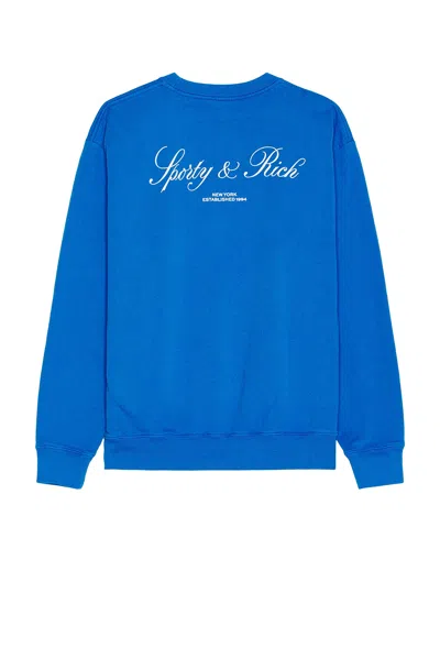 Sporty And Rich Vendome Resort Crewneck In Paris Blue